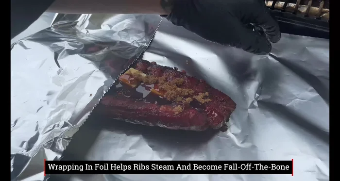 Wrap the ribs: Wrap the fall-off-the-bone ribs tightly in foil.