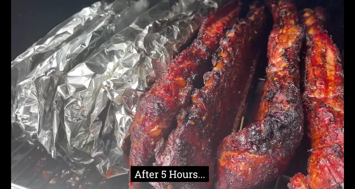 Final cook: Increase the Traeger temperature to 350°F for the last hour. Give the ribs one last spritz.