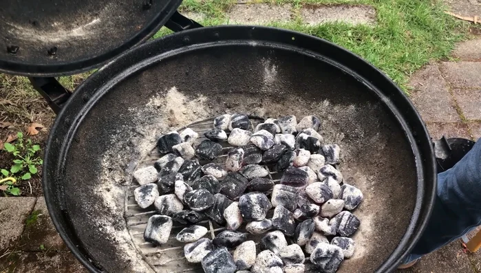 Preheat and clean: Place the grill grate on top, cover for 5 minutes to bake off grease, and then brush with a wire brush.