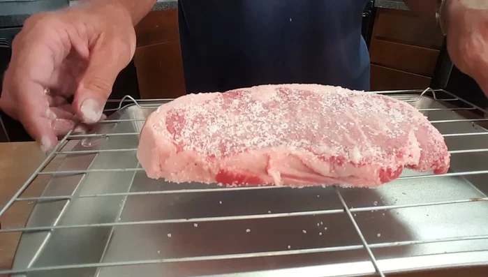 Place the steak on a wire rack over a pan and freeze for 30 minutes.