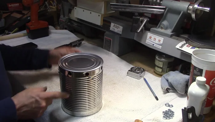 Attach the handle securely using lock washers and nuts (nuts on the inside, flush with the outside).