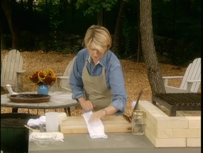 Tie one end of the rolled rag securely with cotton twine, leaving the other end loose.