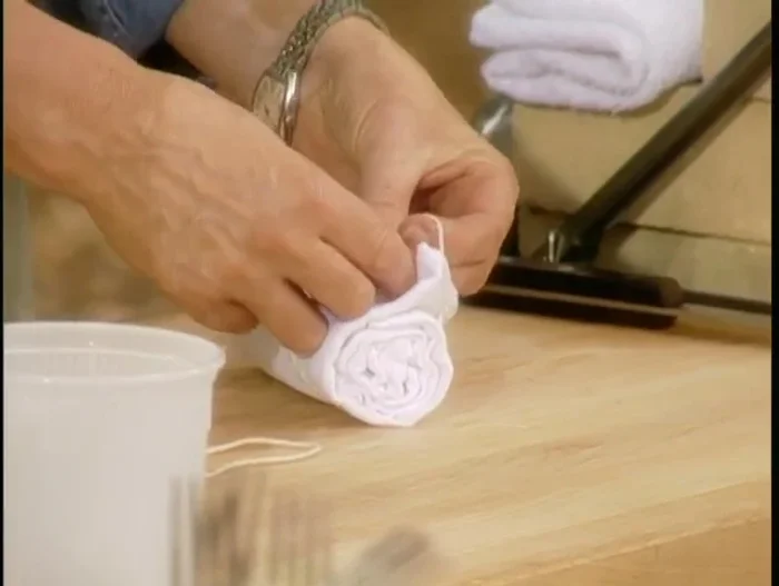 Add a small amount of non-flavored oil (vegetable, safflower, grape seed) to the container.