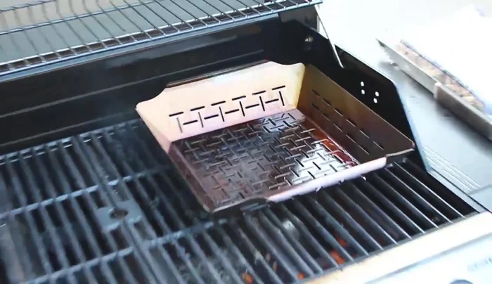Preheat grill basket: Place the grill basket on the preheating grill.