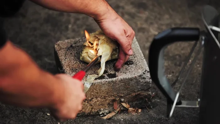 Light the paper towels.