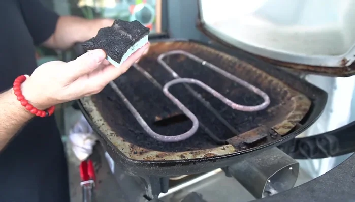 Clean the heating element (if removed) with Dawn and let it soak for 10-15 minutes; scrub and rinse.
