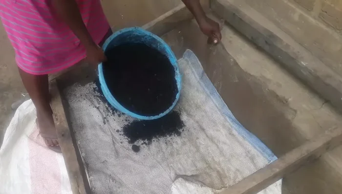 Sieve the ash to remove large particles.