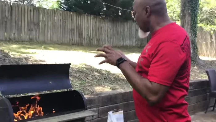 Monitor and adjust the fire: Allow the lighter fluid to burn off. Once the coals have a little white ash on them, they are ready.