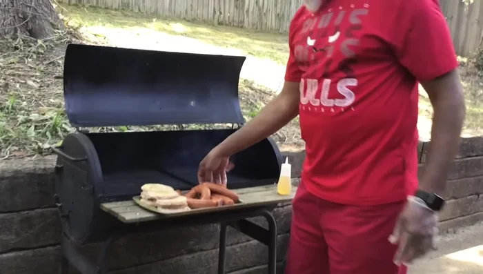 Cook the meat: Place your meat (sausages, chicken, burgers, etc.) on the grill and cook to your preference, flipping occasionally.