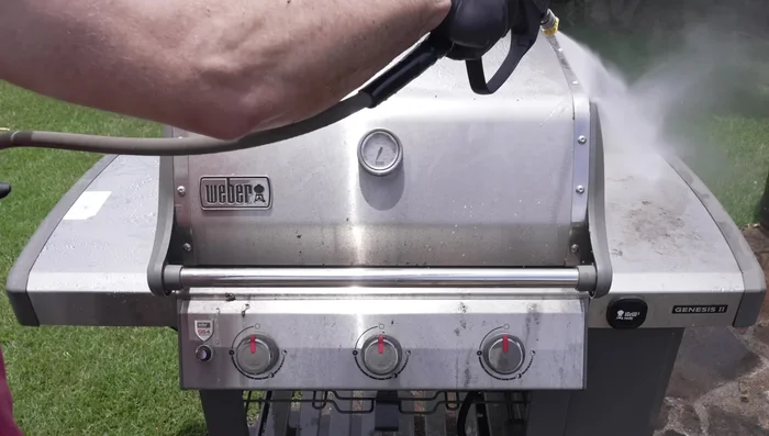 Use the pressure washer again to clean off stubborn dirt and grime (especially effective on the grill grates).
