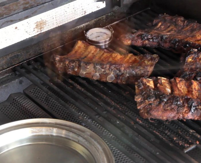 Turn ribs bone-side down and swap their positions. Cook for another 30 minutes.