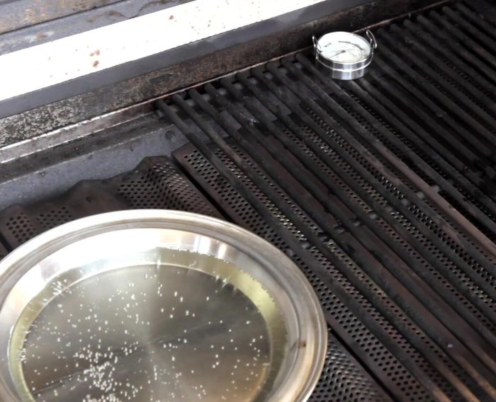 Cook for 1 hour to 1 hour 15 minutes. Replenish smoker box with 4-5 oz of wood chips and refill the water pan.