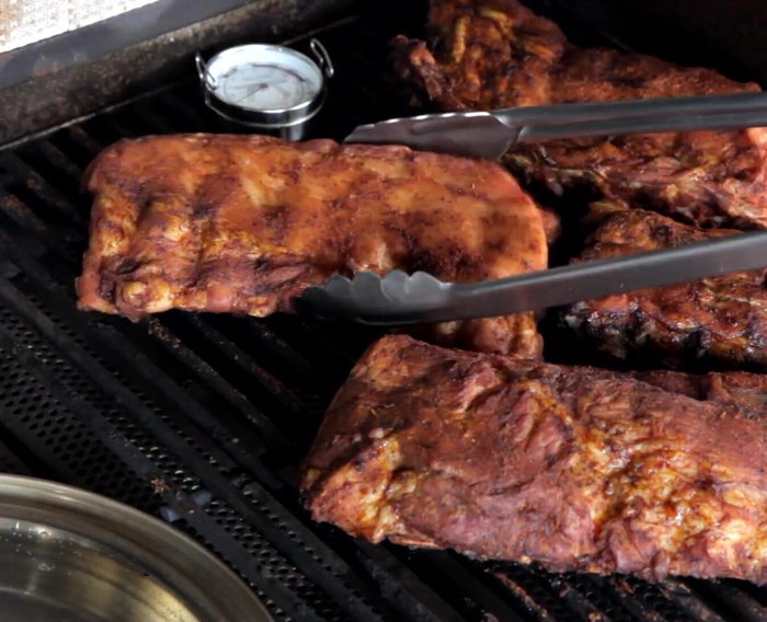 Turn ribs bone-side down and swap their positions. Cook for another 30 minutes.