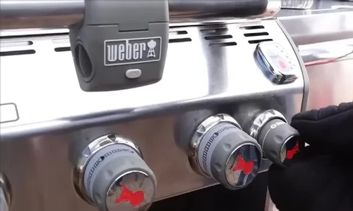 Lower the heat under the smoker box to medium or low to maintain a slow smolder.