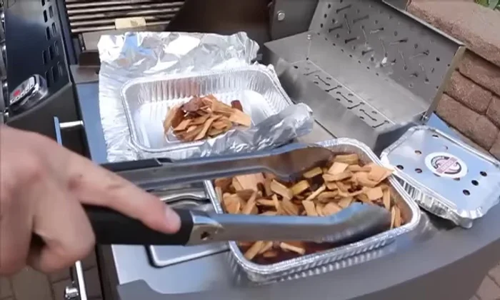 Cover with aluminum foil; poke holes for smoke to escape.