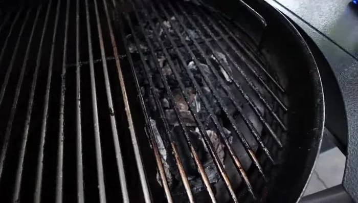 Use the plastic scraper to remove large chunks of debris.