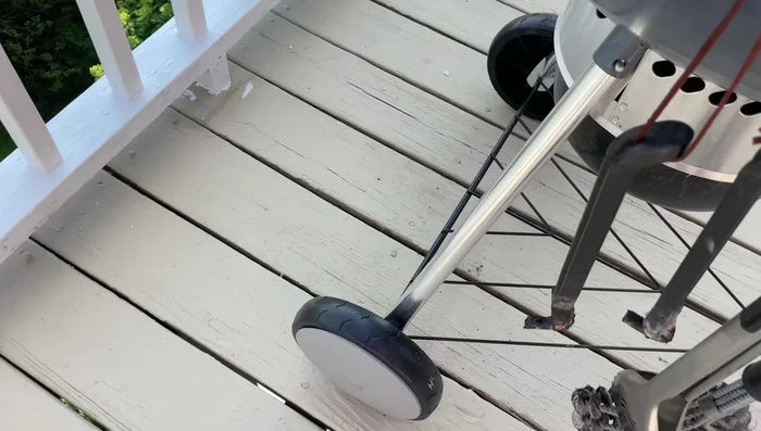 Weber Master Touch grill with integrated wheels