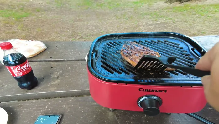 Grilled steak on portable Cuisinart grill