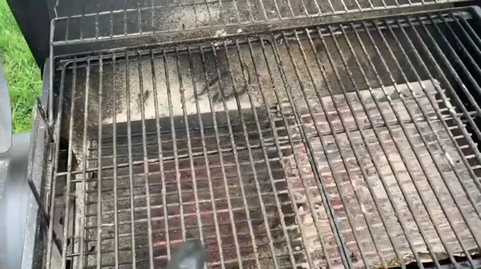 Dirty grill grates need cleaning.