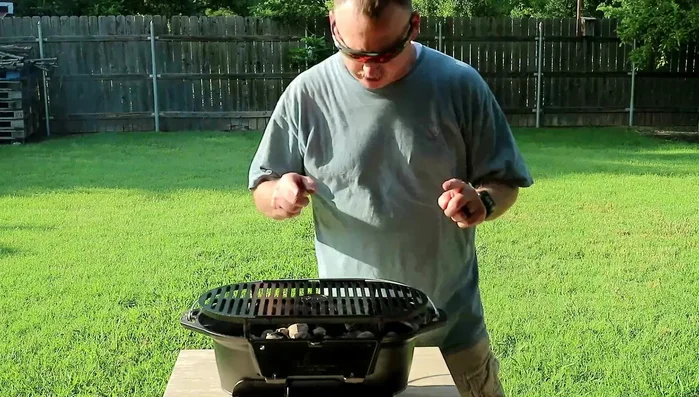 Cast iron grill with adjustable vents