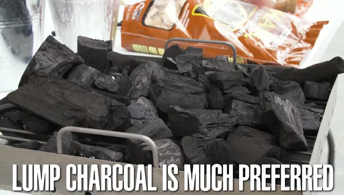 Lump charcoal in grill tray
