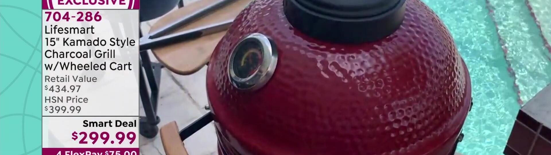 Highlighting the temperature gauge and vents on the grill.