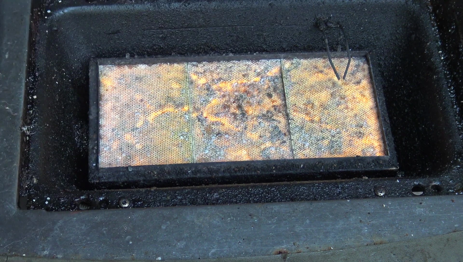 Dirty Napoleon grill sizzle zone needs cleaning.