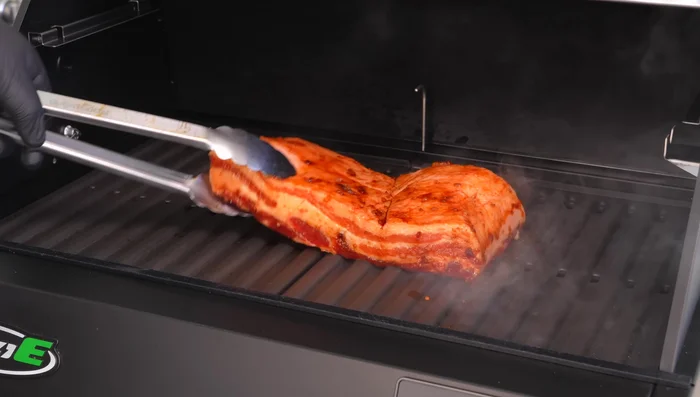 Prepare a pork belly sauce: Combine sesame oil, chili oil, soy sauce, and hoisin sauce.