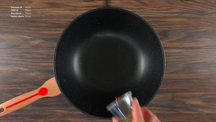 Prepare a pork belly sauce: Combine sesame oil, chili oil, soy sauce, and hoisin sauce.