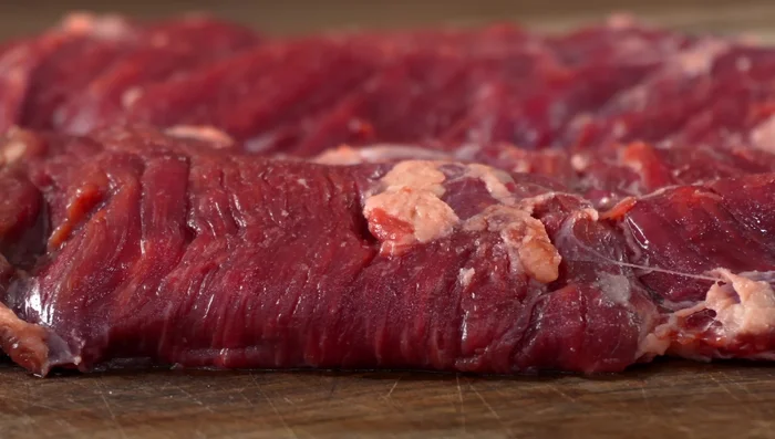 Assemble tacos: Fill tortillas with steak, cilantro, onions, and salsa.