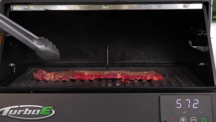 Assemble tacos: Fill tortillas with steak, cilantro, onions, and salsa.
