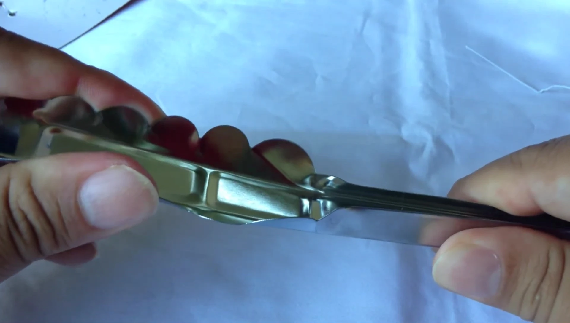 Lightweight grill tongs; thin metal; potential weakness