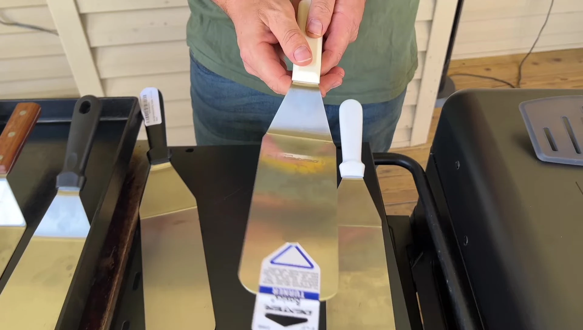 Three spatulas for griddle cooking.