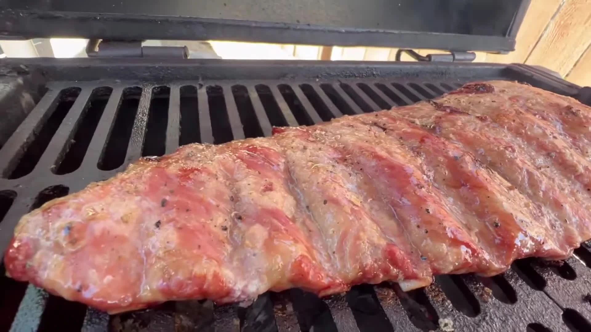 Indirectly smoked ribs on a grill