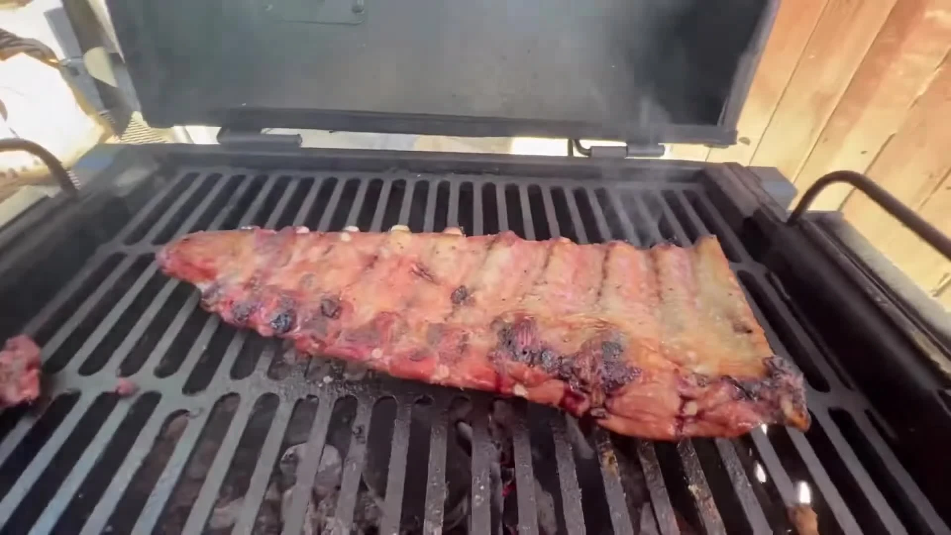 Indirectly smoked ribs on a grill