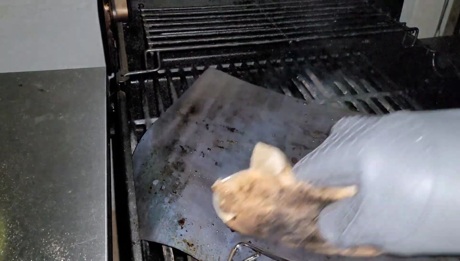 Used grill mat with grease marks