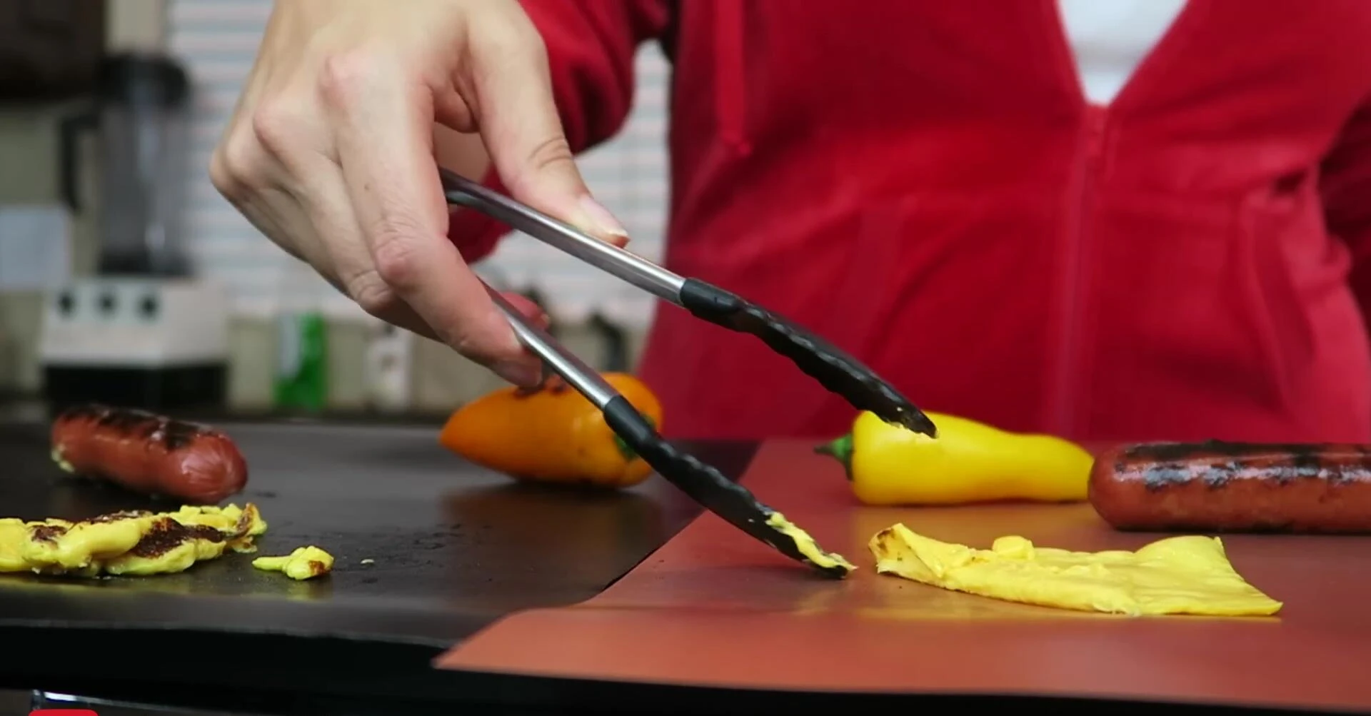 Cheese grilled on two different mats.
