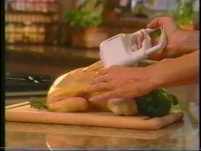 Flavor injector marinating chicken