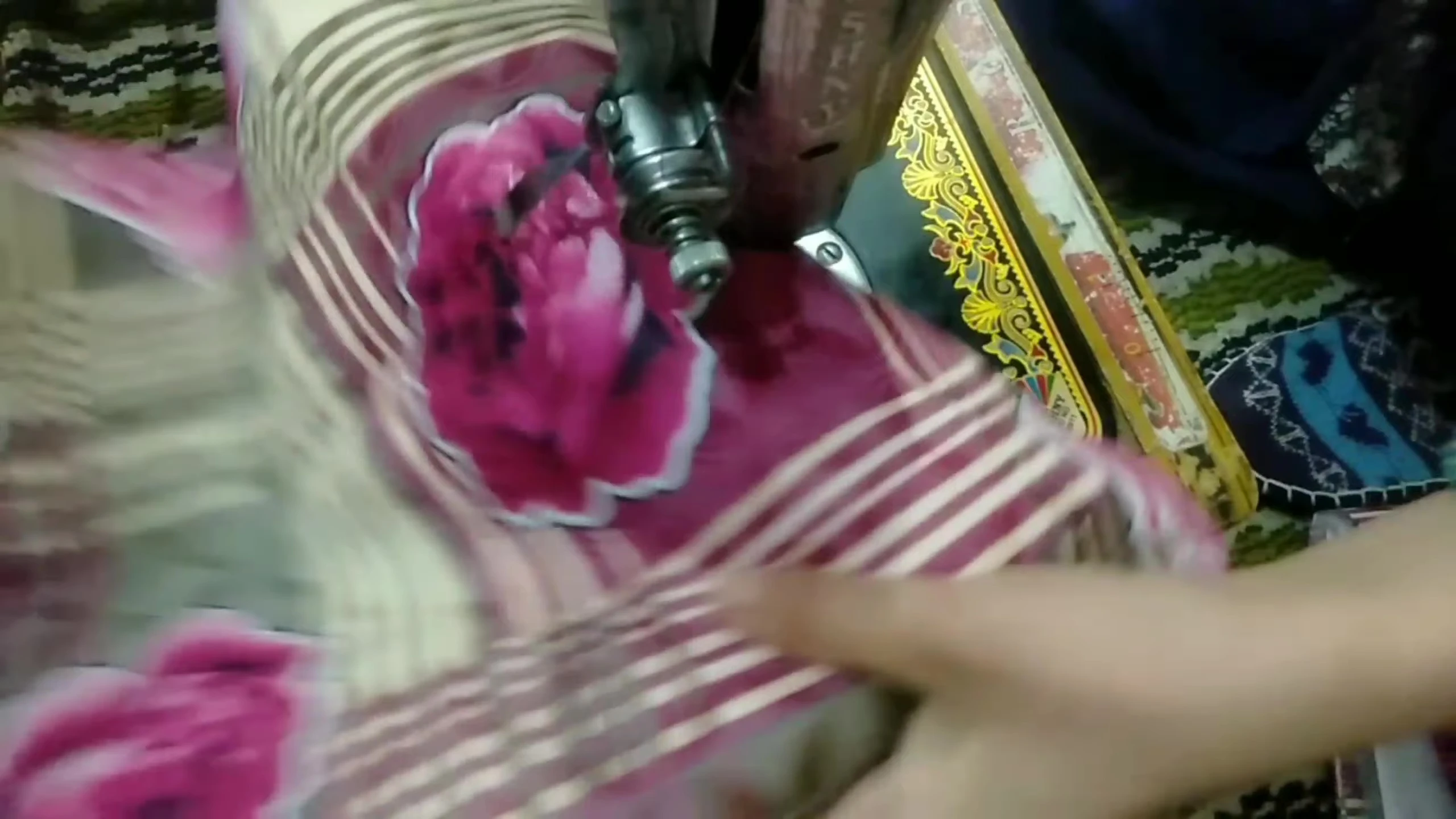 Stitching the glove pieces together.