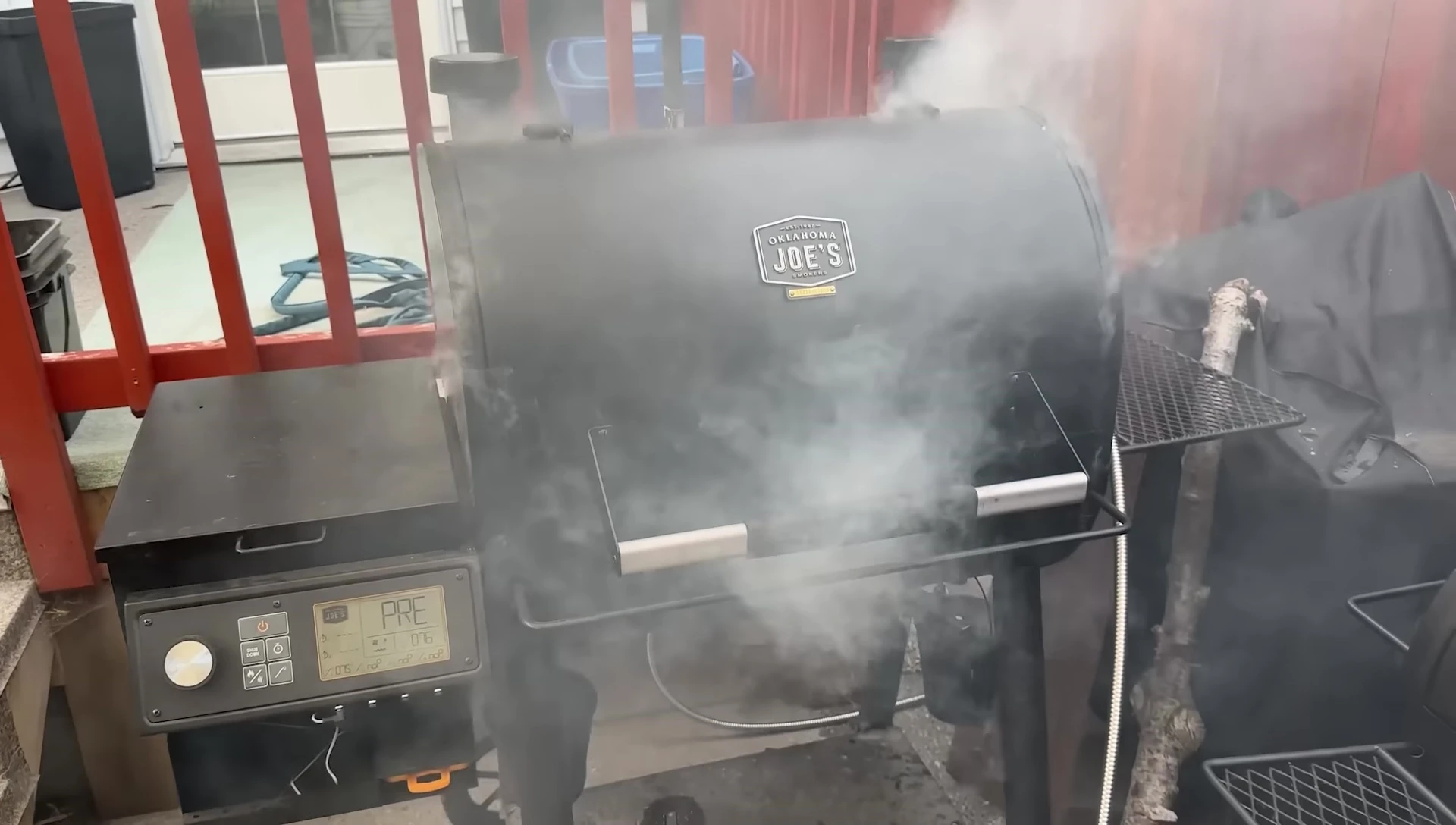 Smoker cooking pork and ribs.