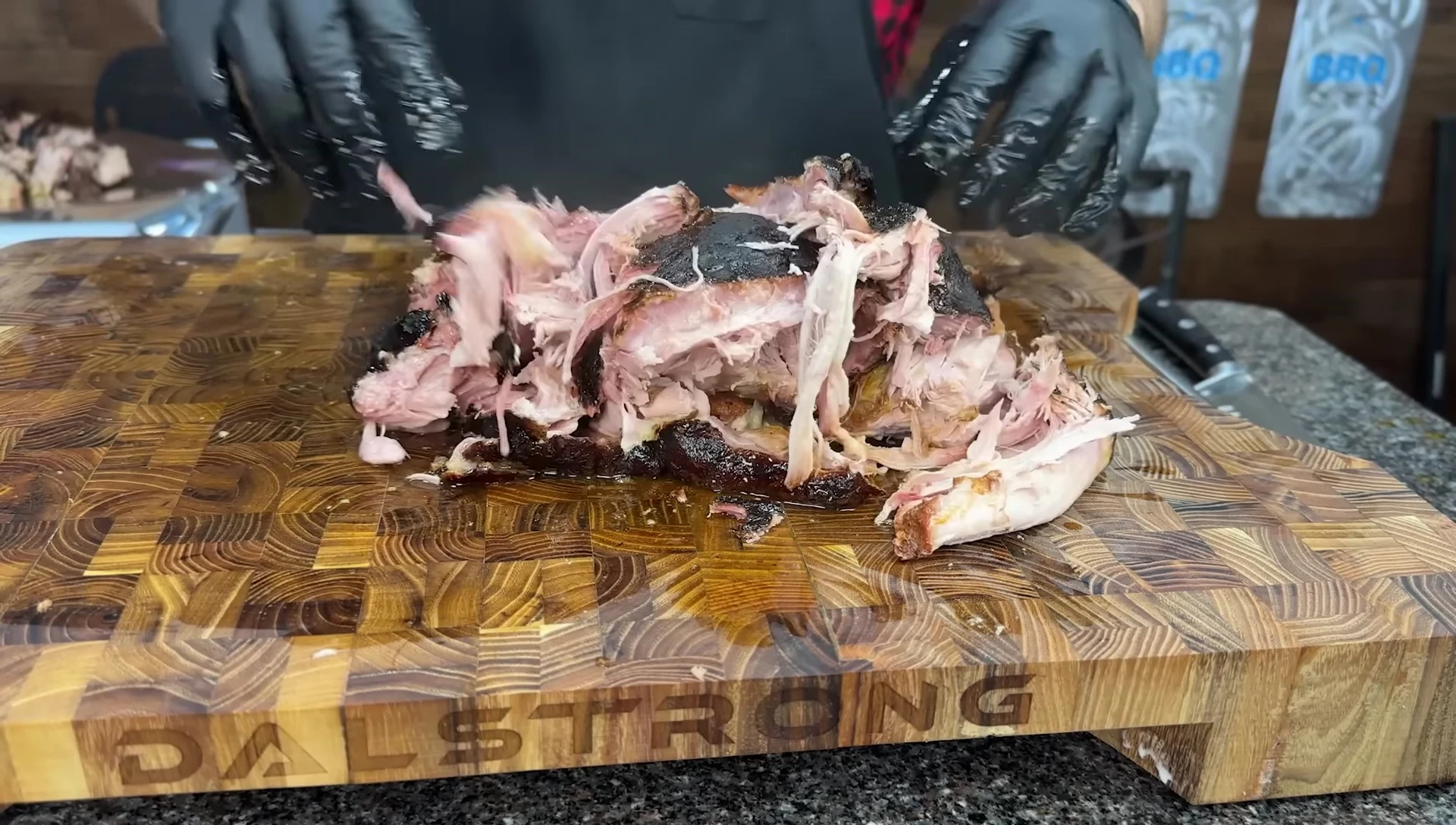 Pulled pork butt on cutting board
