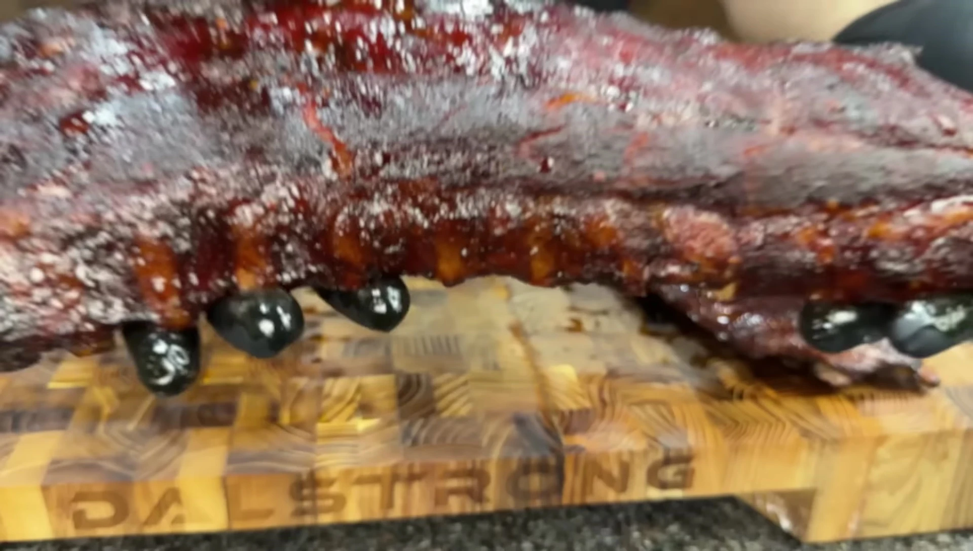 Smoked ribs on cutting board