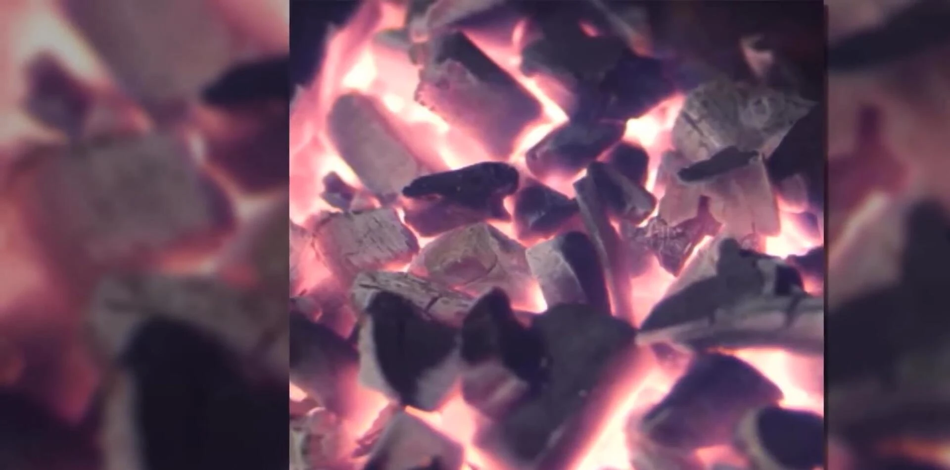 Glowing Duraflame briquettes burning