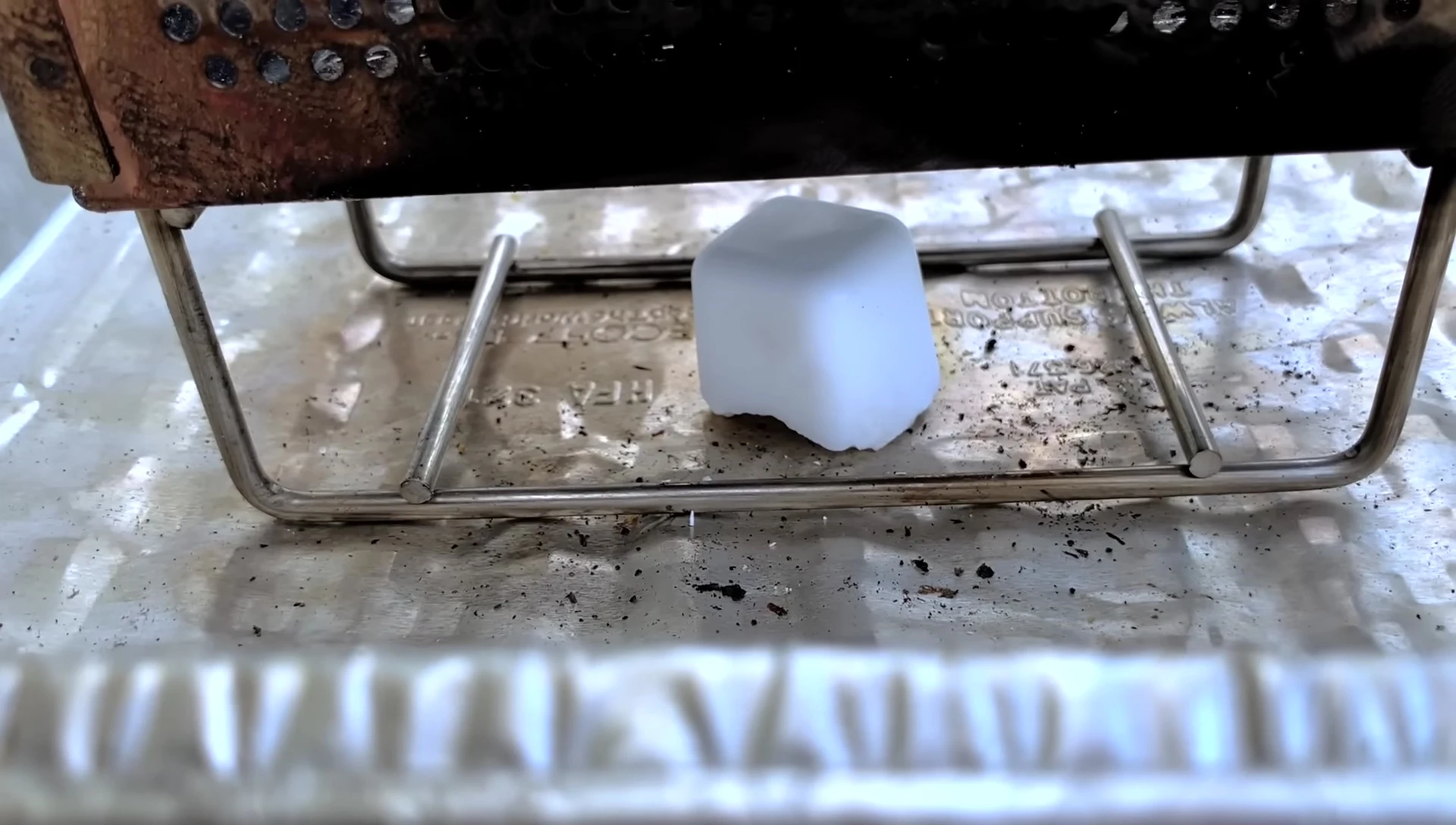 Weber lighter cubes ignite charcoal briquettes.