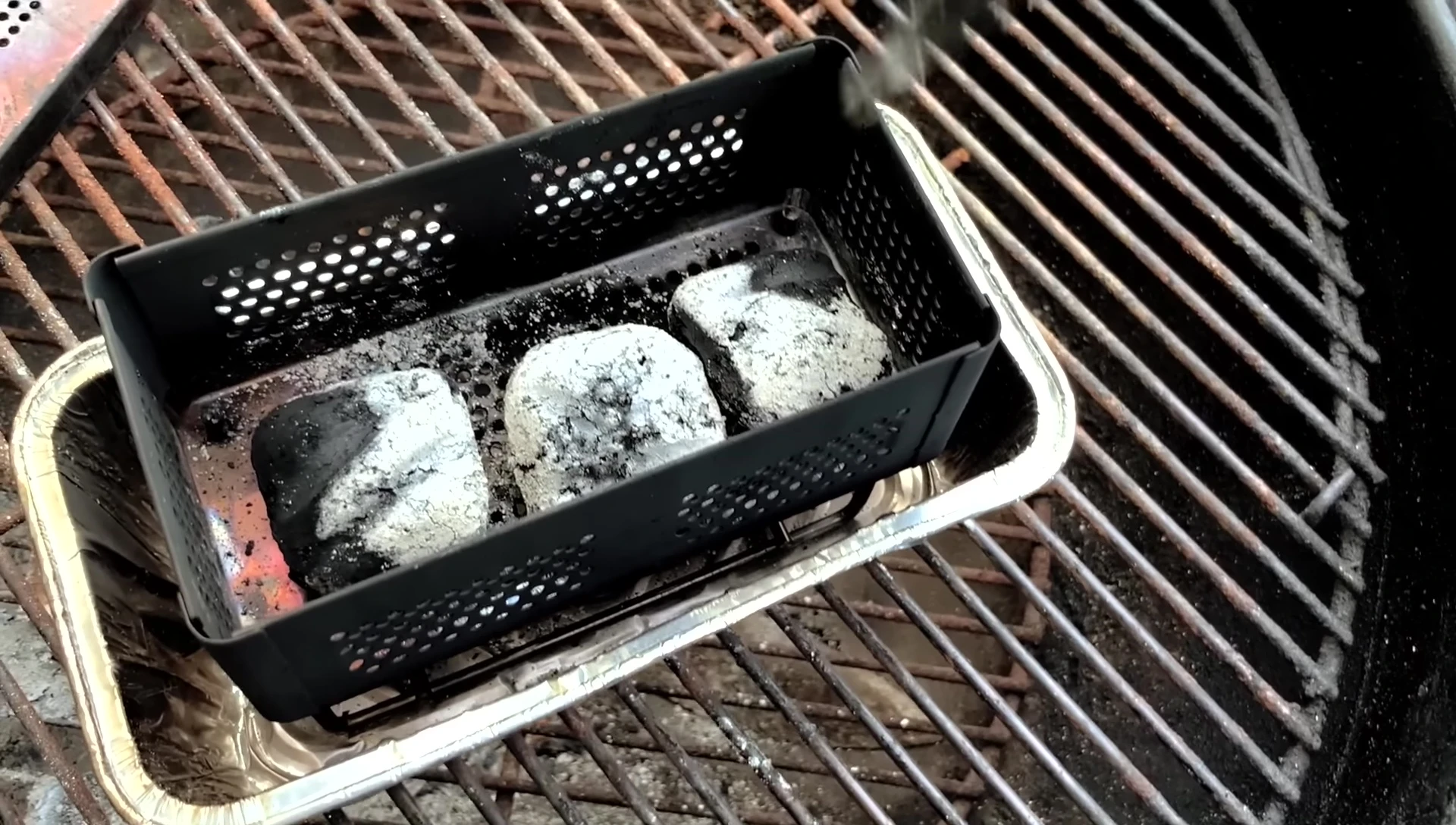 Charcoal and wood chunks in smoker box
