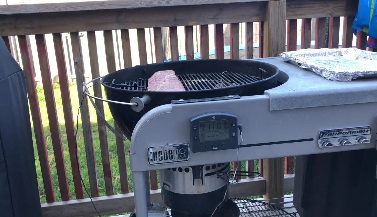 Weber grill cooking ribs at 250°F