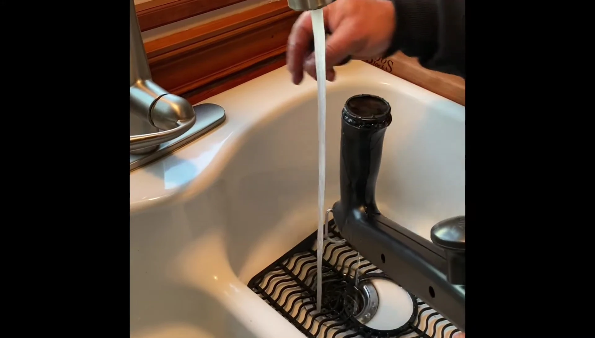 Checking for water spills after filling.