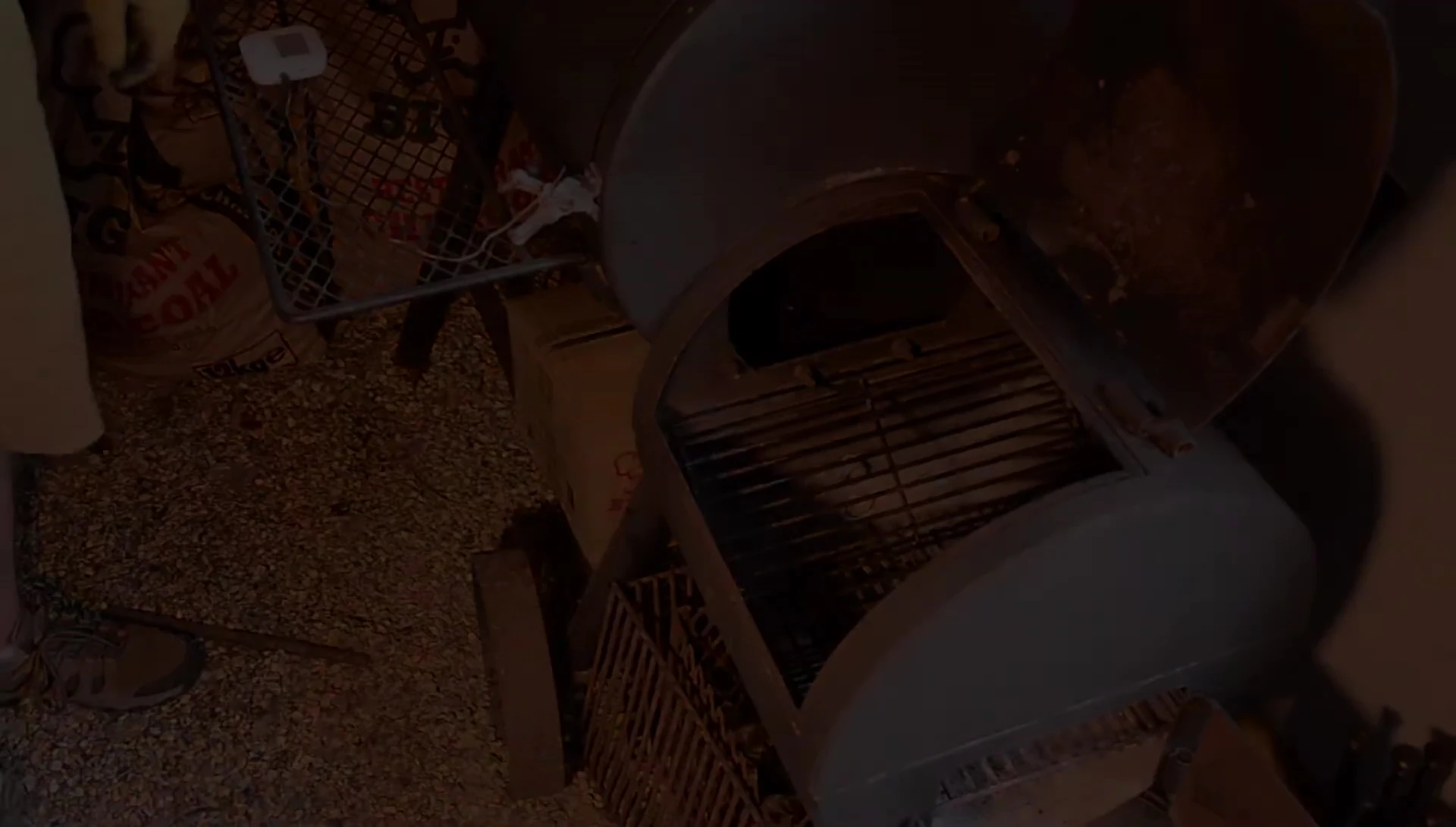 Burning briquettes in a smoker grill