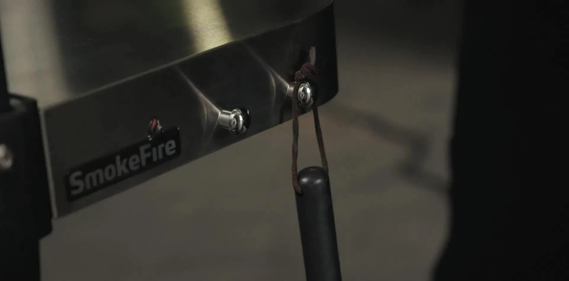 Close up of grill grates showing food residue changing from caramel to carbon