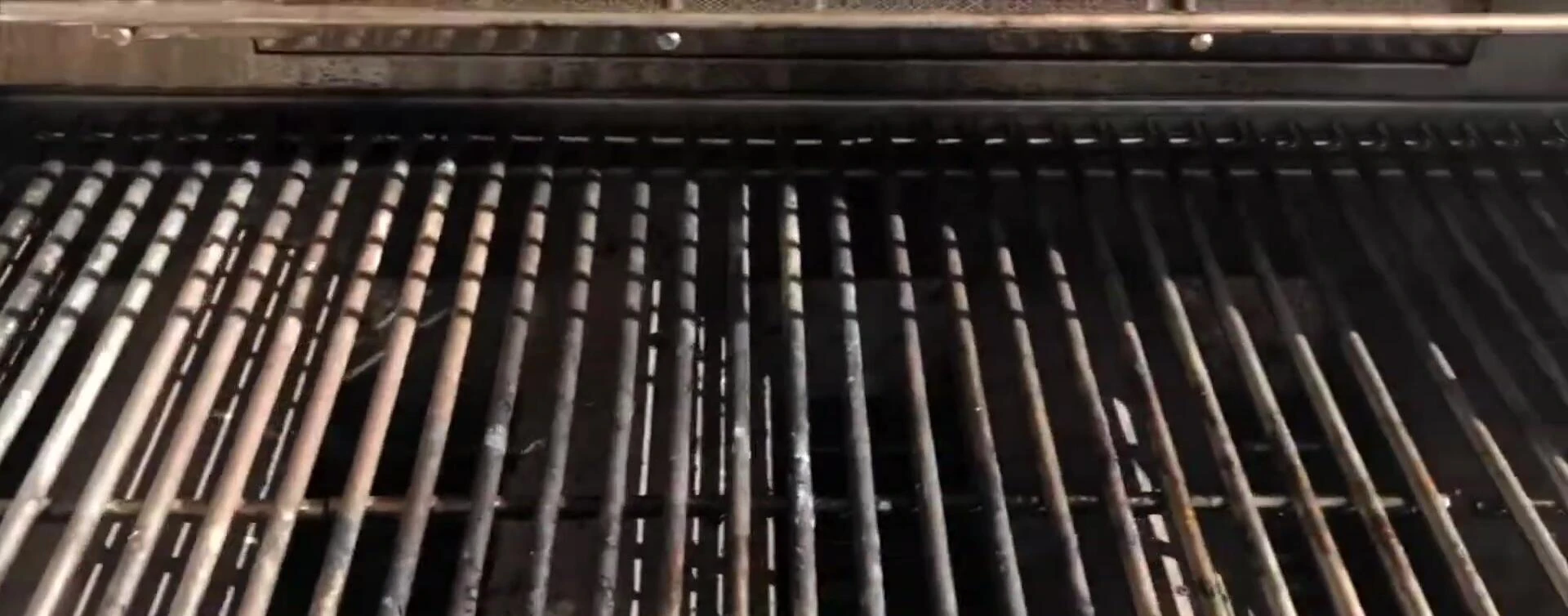 Dirty grill grates before cleaning